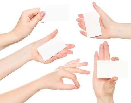Various hands displaying blank cards in different positions during a creative Stock Photos
