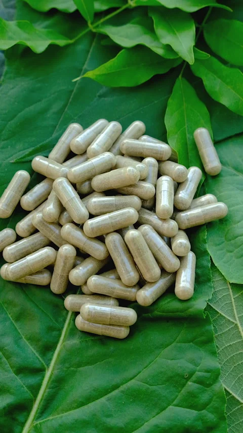Various herbal supplement capsules. Selective focus. Stock Footage 318746167