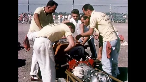 Various hot rods are driven, including a Chevrolet and a Chrysler, in the 5th Stock Footage