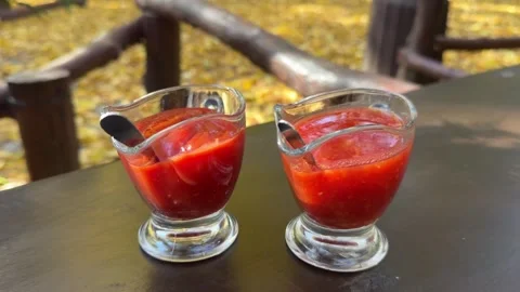 Various hot sauces are on the table in a restaurant, food, chili, ketchup Stock Footage 325033276