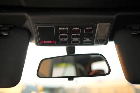 The various Interior Dashboard Controls of a Vintage BMW e30 Vehicle offer both Stock Photos
