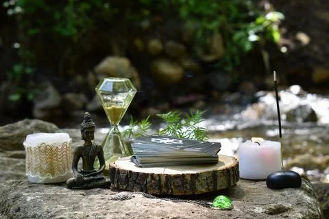 Various items for rituals and divination on a large stone on the background of a Stock Photos