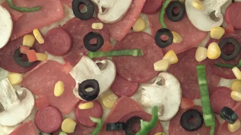 Various kind of toppings drop onto a pizza dough in slow motion Stock Footage 161525875