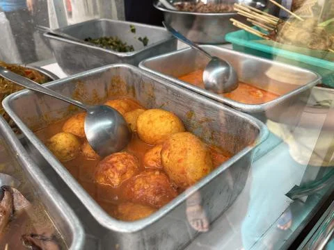 Various kinds of dish inside a showcase in a traditional restaurant Stock Photos