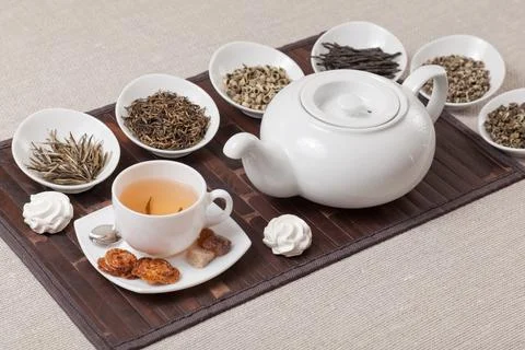 Various kinds of tea with cup and teapot Stock Photos