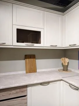 Various kitchen sample units displayed in a large showroom to inspire home .. Stock Photos