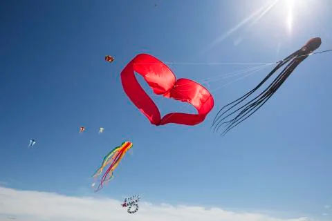 Various kites kites on the beach Octopus Heart Portbail Cotentin Normandy Stock Photos