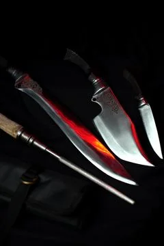 A various knife sizes with a handle Stock Photos
