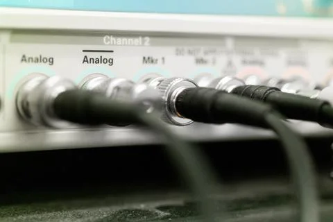 Various lead cable connectors plugged in a scientific signal measuring device Fotos de archivo