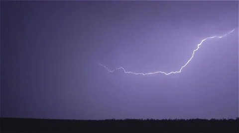 Various lightning bolts strike forest night landscape, sound included Stock Footage 27386553