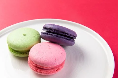 Various macarons in a plate. Stock Photos