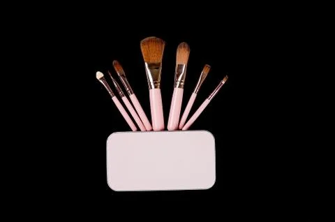 Various Makeup Brushes on black Background Stock-Fotos