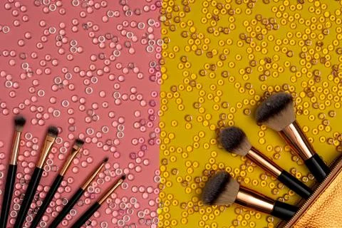 Various makeup brushes on glitter background, top view Stock Photos