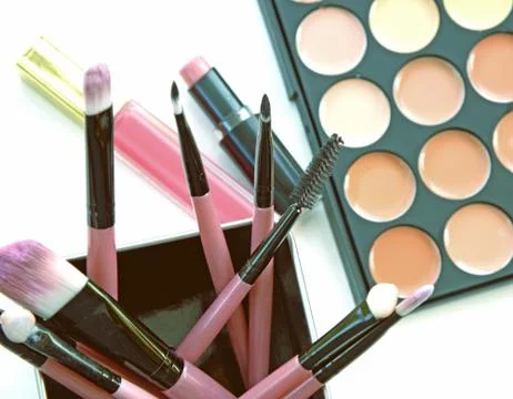 Various makeup brushes on light background (Vintage tone) Stock Photos
