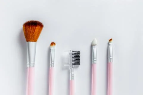 Various makeup brushes on white Stock Photos