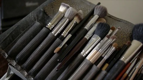 Various makeup products on dark background Stock Footage 70302745