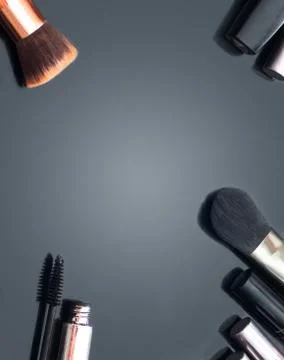 Various makeup products on a plain background Stock Photos