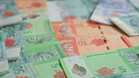 Various malaysian ringgit banknotes scattered on a flat surface featuring d.. Stock Footage 288439524