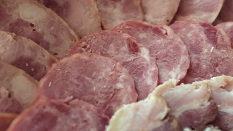 Various meat products on a plate, beef and pork meat, sliced ​​meat Stock Footage 219329467