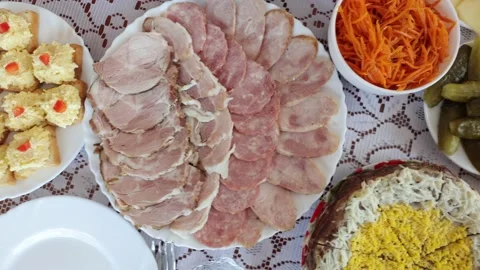 Various meat products on a plate, beef and pork meat, sliced ​​meat Stock Footage 219329519