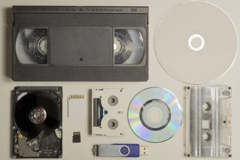 Various media types. compact disc. memory card. video tape. digital video and Stock Photos
