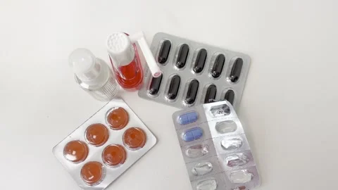 Various medications, pills, and supplements for health and wellness rotatin.. Stock Footage 335141652