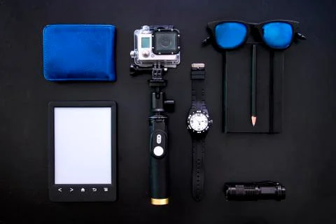 Various men's items at the black table laid out in the correct order Stock Photos