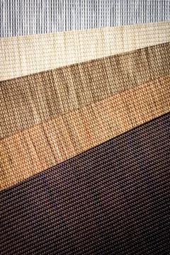 Various natural fabric samples background. Selective focus Stock Photos