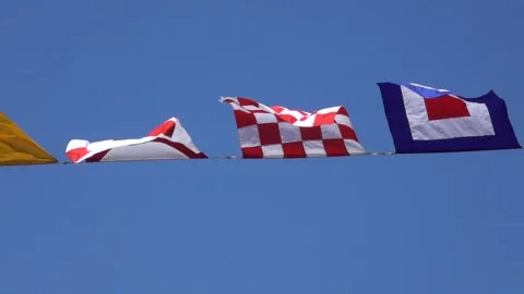 Various nautical flags tied together with rope, Ship flags signals, morse code, Stock Footage 256145177
