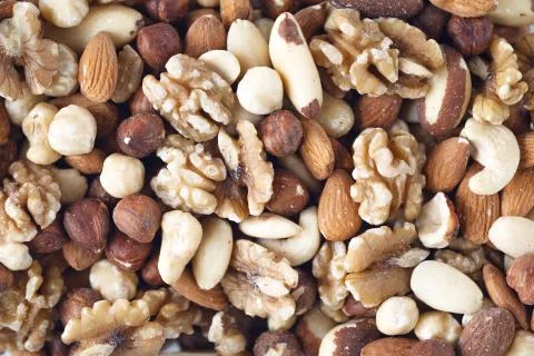 Various nuts as a background Stock Photos