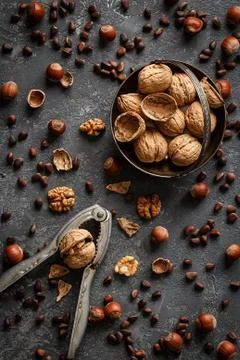 Various nuts on stone table. Top view Stock Photos