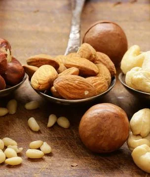 Various nuts (walnuts, cashews, almonds) assorted for healthy eating Stock Photos