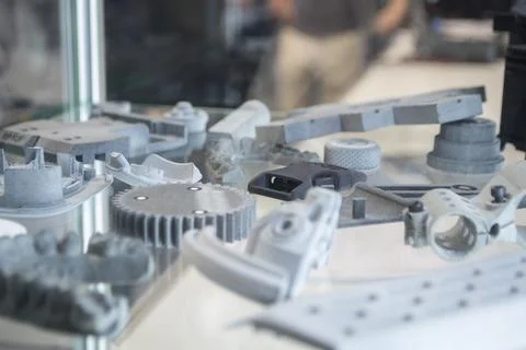 Various objects printed 3D printer from molten plastic powder. Different models Stock Photos