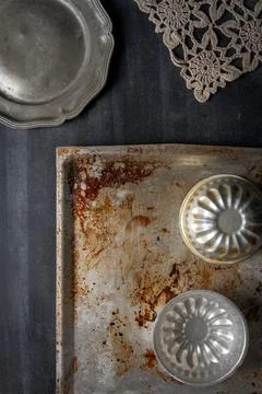 Various old kitchen objects on black chalkboard background Stock Photos