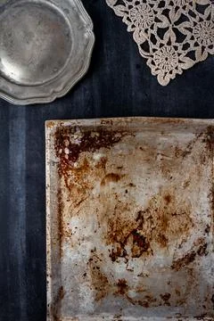 Various old kitchen objects on black chalkboard background Stock Photos
