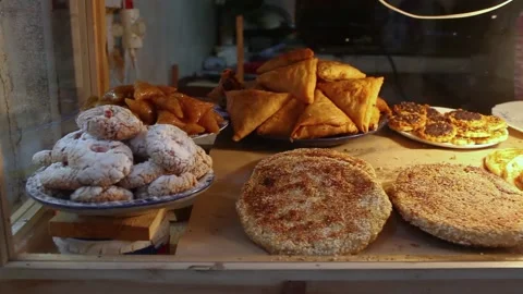 Various Oriental bread cakes on a counter of the market in Fez  Medina 库存影片 130234715