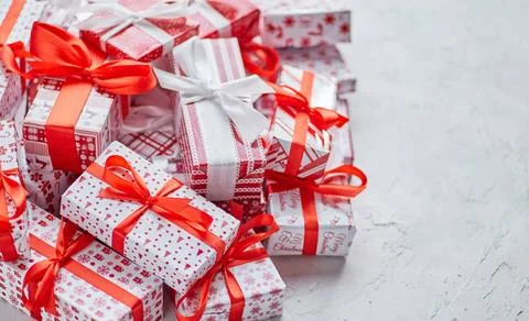Various pattern and size Christmas boxes placed on white background. Wrapp... Stock Photos