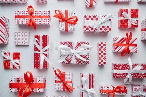Various pattern and size Christmas boxes placed on white background. Wrapp... Stock Photos