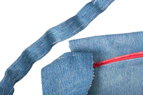 Various pattern pieces in blue denim fabric Stock Photos