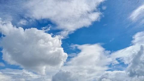 Various patterns of clouds spread across in blue sky.Sky cloud on summer Stock Photos