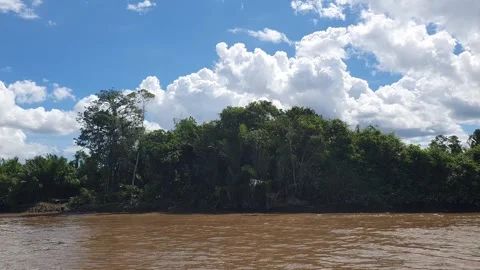 Various patterns of white clouds in the blue sky above the Kapuas River 스톡 동영상 337226020