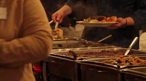 Various People Getting Food From a Buffet Stock Footage 37495147
