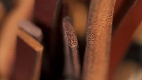 Various pieces of leather in the workshop macro closeup Stock Footage 71503760