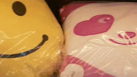 Various Pillows Available For Purchase Stock Footage 155461322