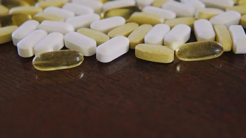 Various pills and tablets, close up dolly shot with selective focus Stock Footage 126570613