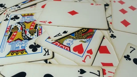 Various playing cards rotate on table. Stock Footage 72166348