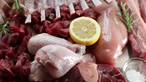 Various raw meats. Top view, rotate Stock Footage 303256584