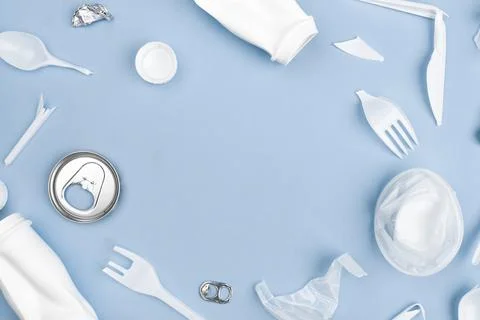 Various recyclable garbage on a blue background Stock Photos