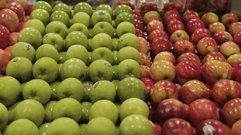 Various red and green apples on display in fruit shop. Stock Footage 93103583