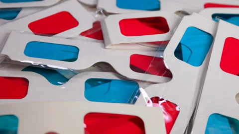 Various Red-Cyan 3D Anaglyph Cardboard Glasses. Vídeos de archivo 281360687